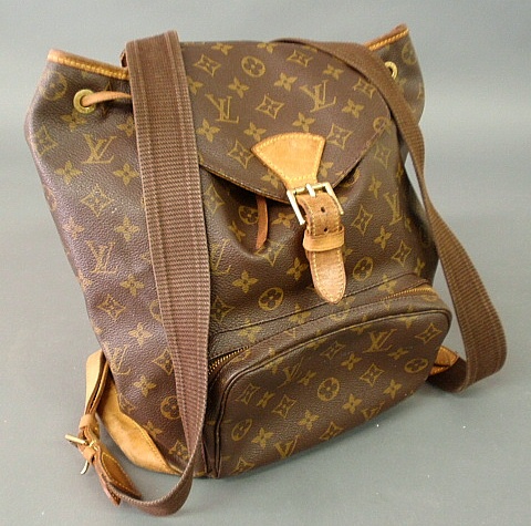 Appraisal: - Louis Vuitton backpack in traditional brown leather with tan