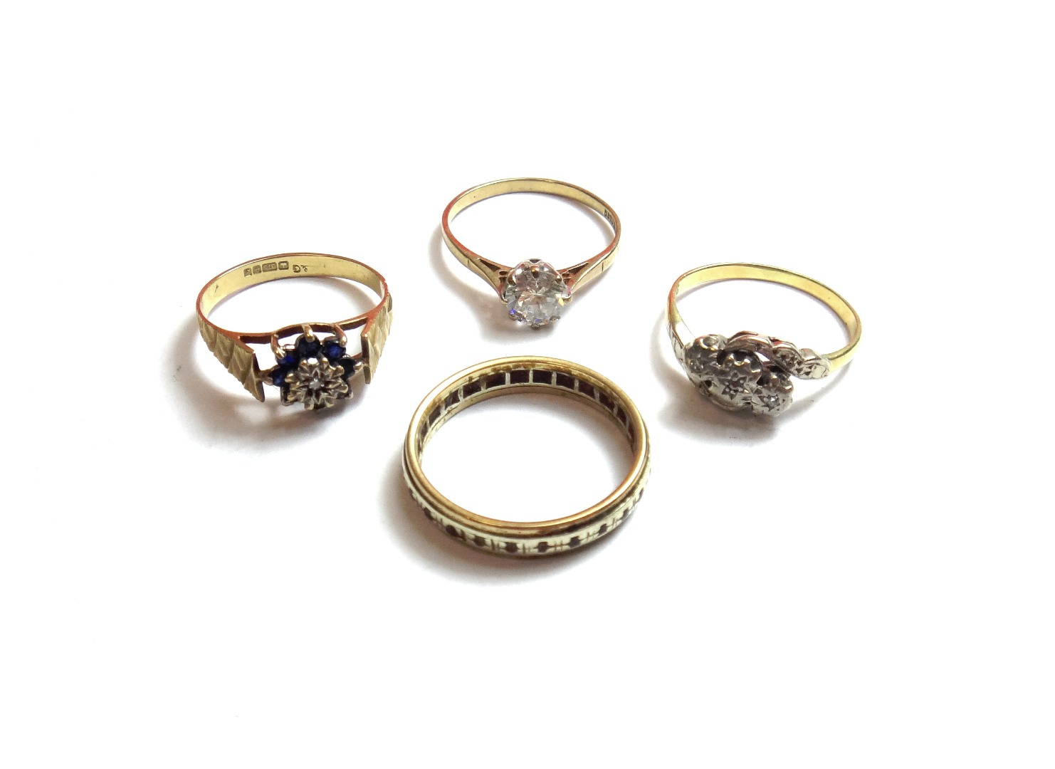 Appraisal: A ct gold sapphire and diamond set cluster ring a