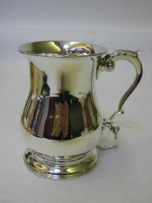 Appraisal: A TANKARD maker Son Ltd London of baluster form with