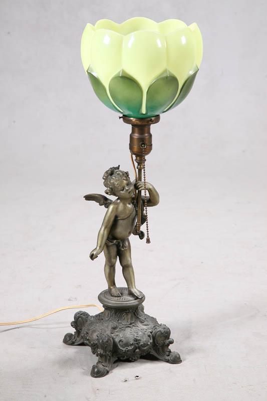 Appraisal: TABLE LAMP Speleter lamp with cherub and a green and