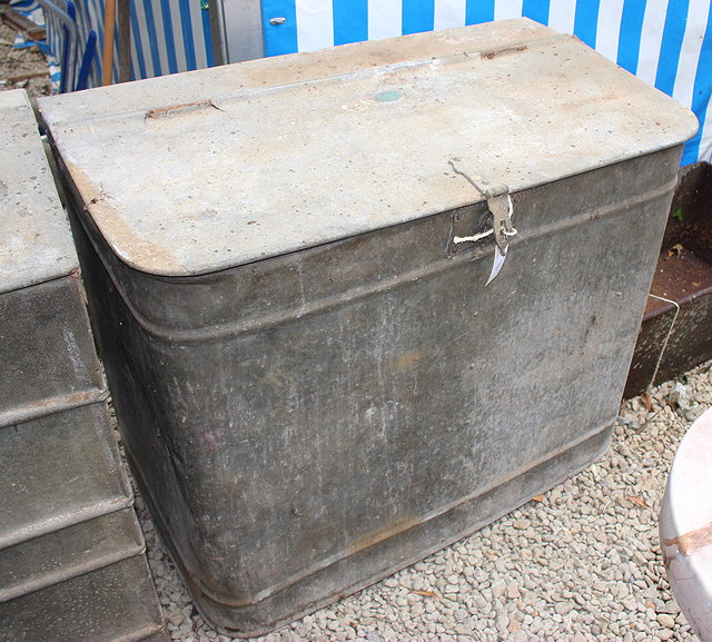 Appraisal: AN OLD GALVANIZED GRAIN BIN with rounded front corners cm