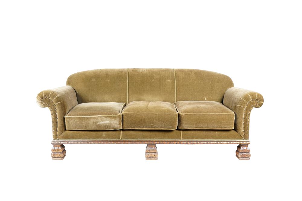 Appraisal: GREEN UPHOLSTERED SOFAcovered with olive green mohair raised on carved