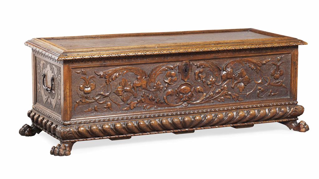 Appraisal: ITALIAN WALNUT CASSONE TH CENTURY the moulded hinged top above