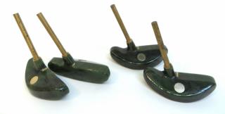 Appraisal: Four Jade Putter Heads Four Jade Putter Heads Four green