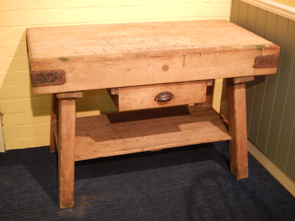 Appraisal: A vintage butcher's block the rectangular top with iron corners