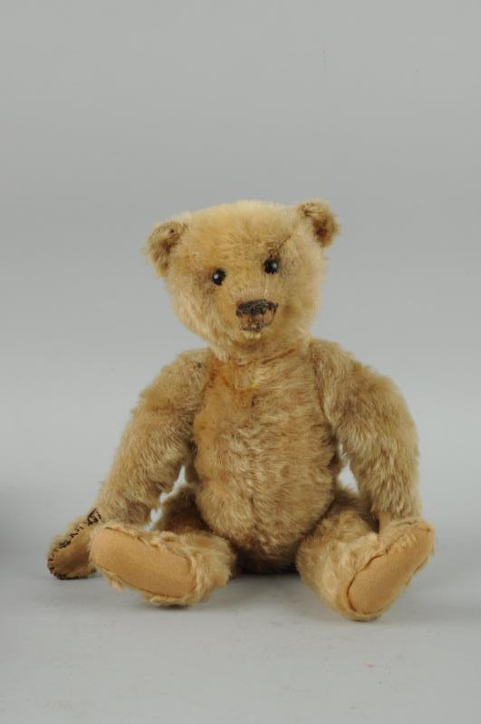 Appraisal: Circa Teddy Bear This teddy bear has one repaired paw