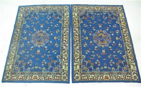 Appraisal: PAIR CHINESE STYLE BLUE GROUND RUGS Both X in