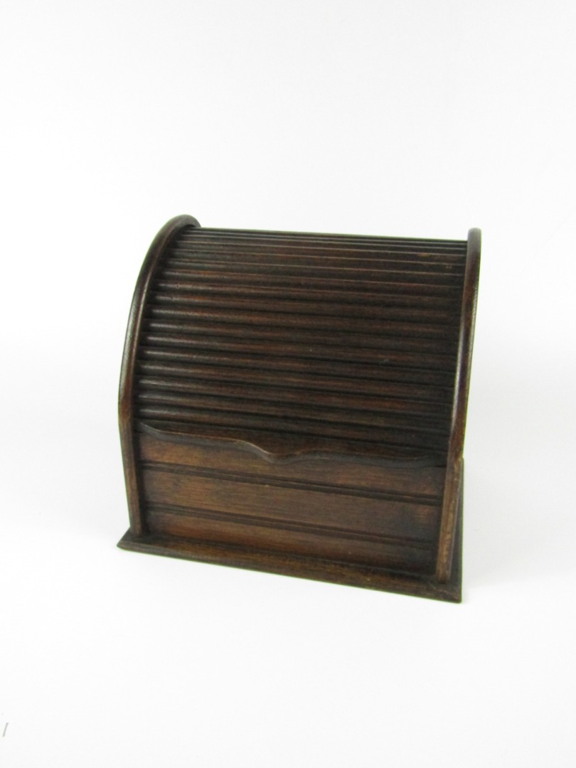 Appraisal: A late thC oak tambour stationery rack cm x cm