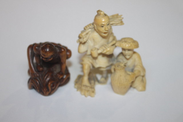 Appraisal: A JAPANESE WOOD NETSUKE Sennin Gama with large toad circa