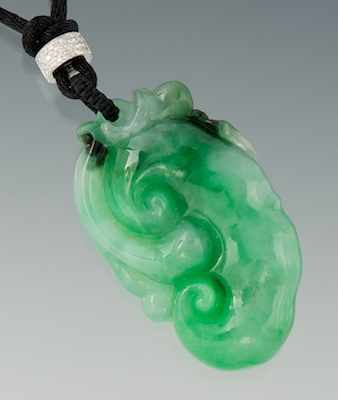 Appraisal: A Carved Natural Color Jadeite Ruyi Pendant Natural type A