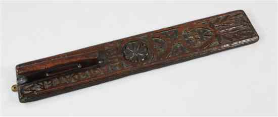 Appraisal: A mangle board Scandinavian th century plain handle deeply carved