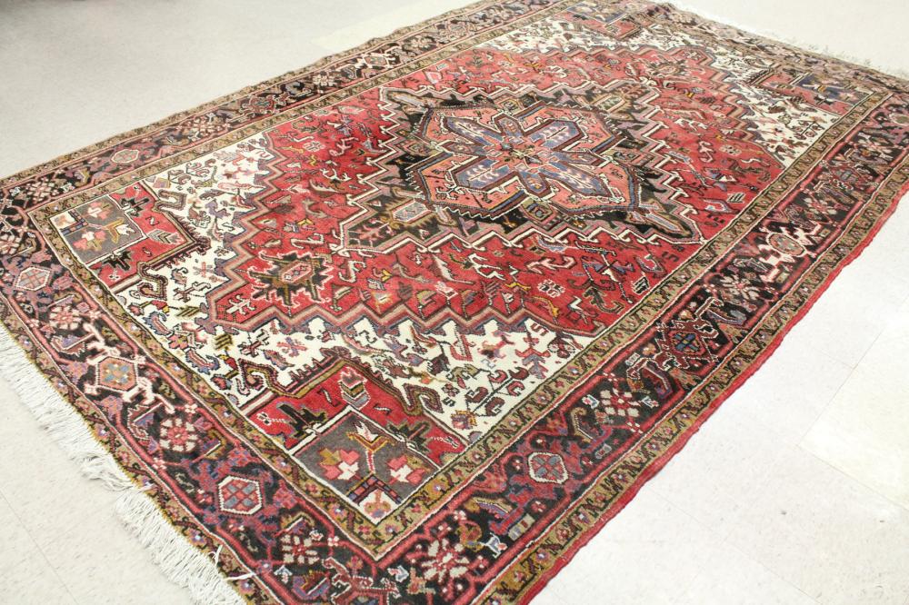 Appraisal: SEMI-ANTIQUE PERSIAN HERIZ CARPET East Azerbaijan Province northwestern Iran central