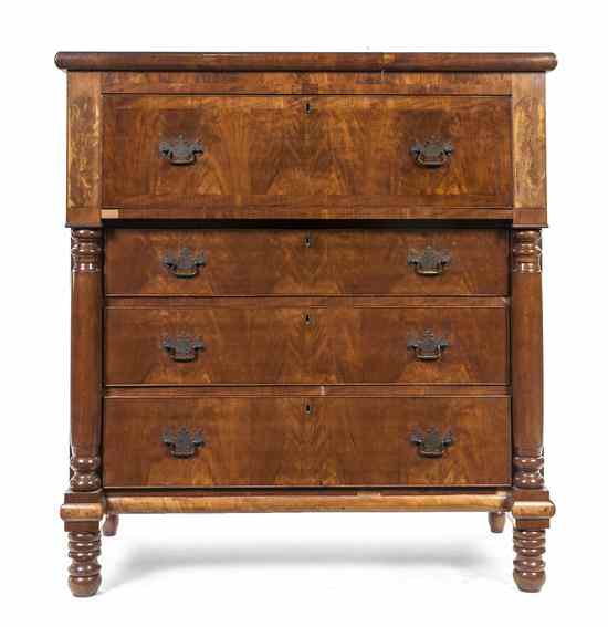 Appraisal: An American Classical Style Mahogany Veneered Chest of Drawers having