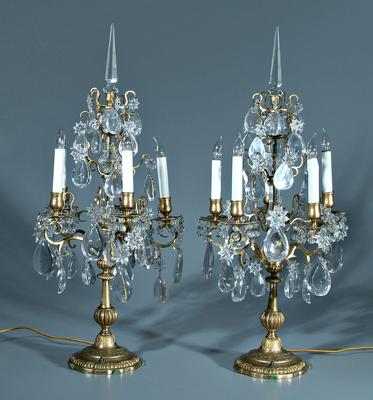 Appraisal: Pair brass candelabra each with five candle type lights hung