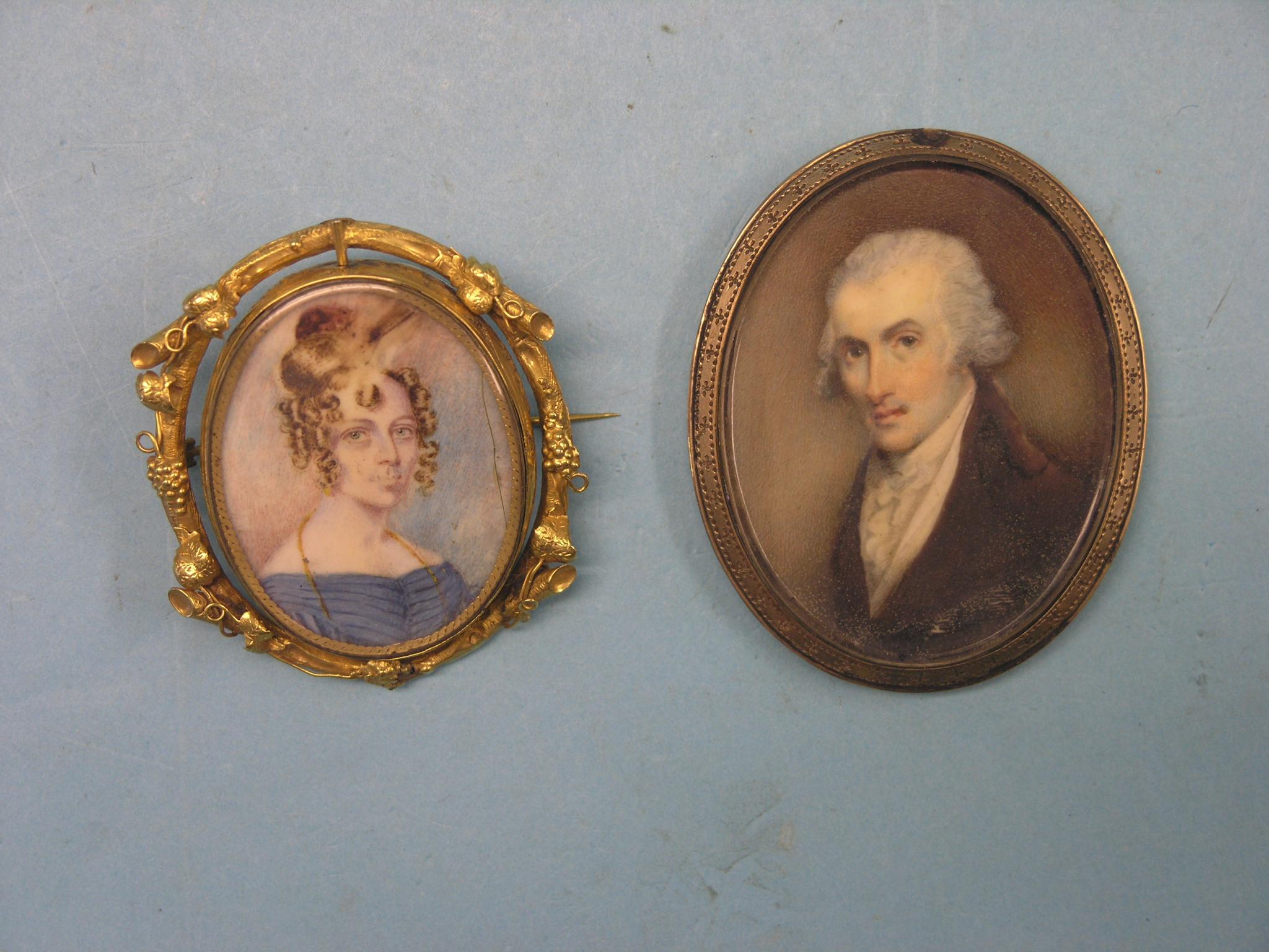 Appraisal: A Victorian yellow metal revolving portrait miniature frame named male