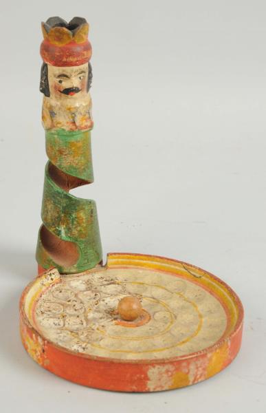 Appraisal: King Marble Tower Kakelorum Polychrome wood Green spiral head of