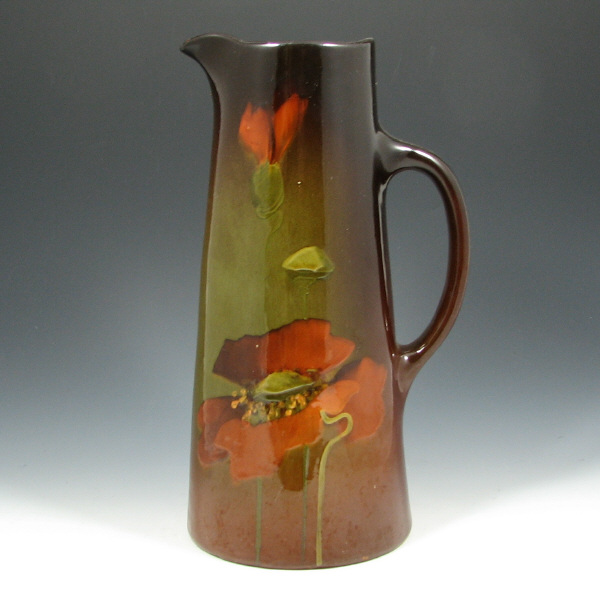 Appraisal: Weller Louwelsa Tankard Weller Louwelsa tankard with poppy decoration Marked