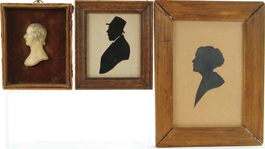 Appraisal: THREE SILHOUETTES Cutout of woman Unidentified in simple pine frame