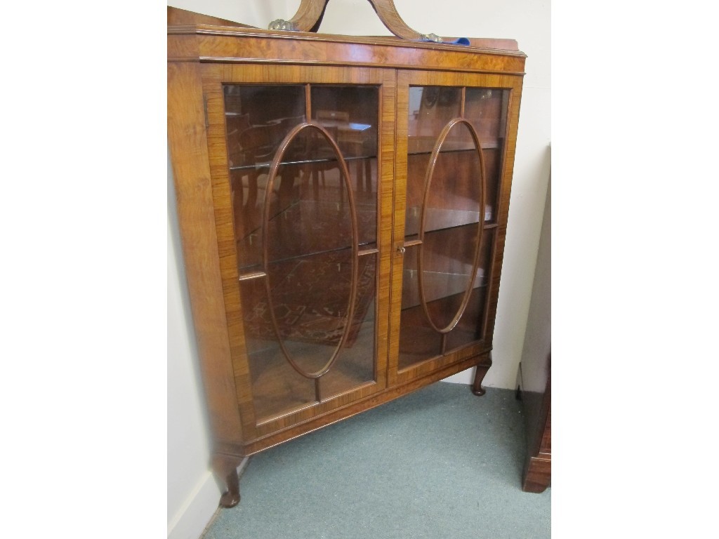 Appraisal: Walnut glazed corner cabinet