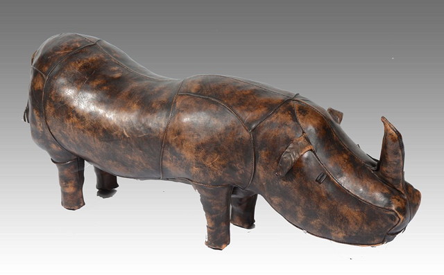 Appraisal: A LEATHER MODEL OF A RHINOCEROS with stitched finish long