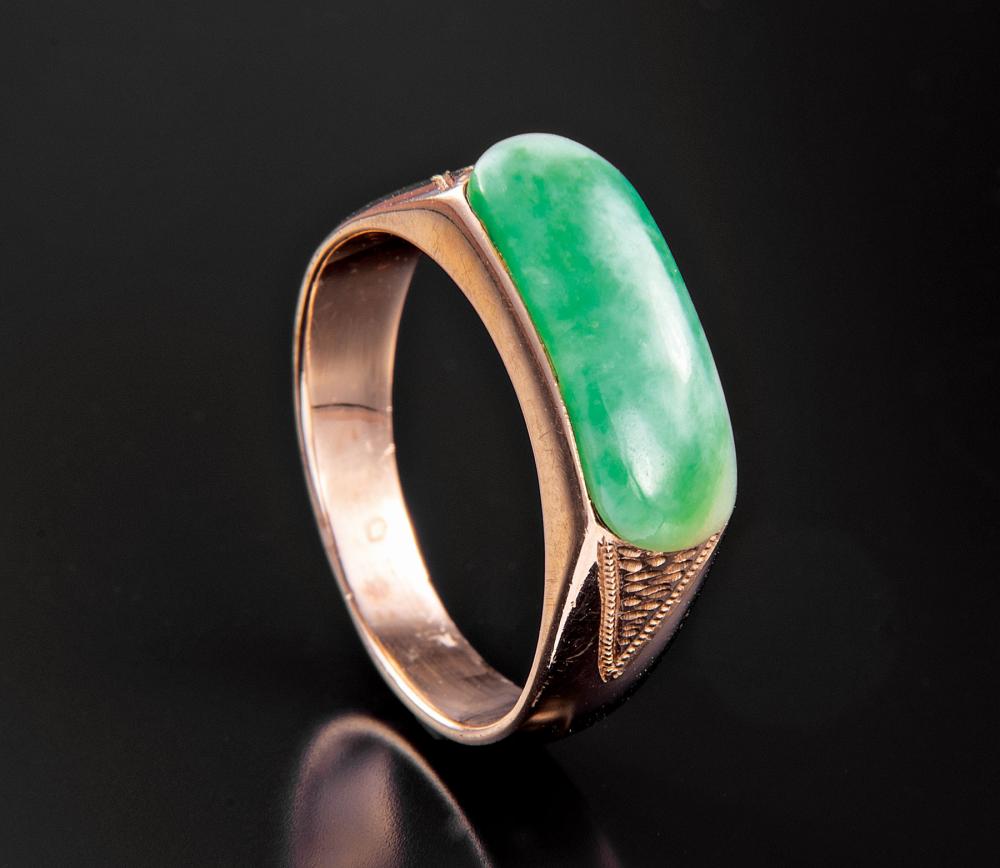 Appraisal: kt Yellow Gold and Chinese Jadeite Saddle Ring marked size