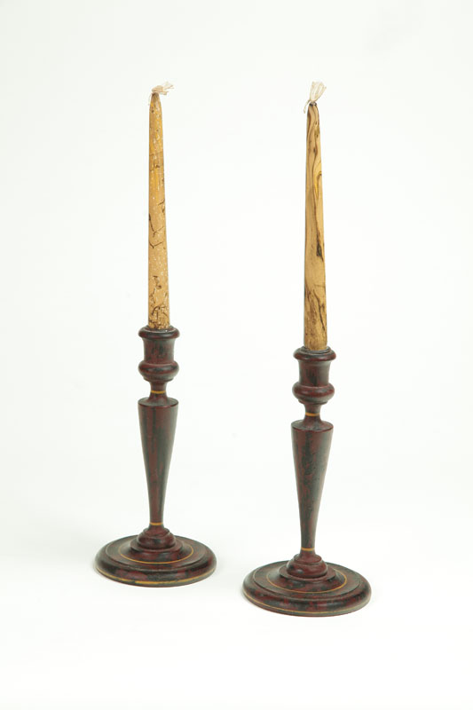 Appraisal: PAIR OF DECORATED TREEN CANDLESTICKS Attributed to Maine - probably