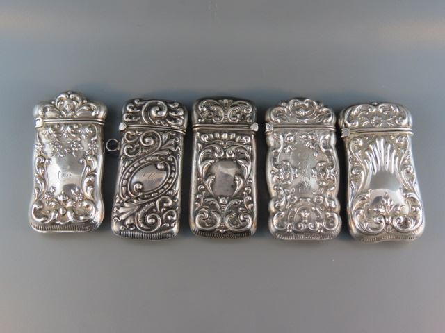 Appraisal: Sterling Silver Match Safes various florals circa most X