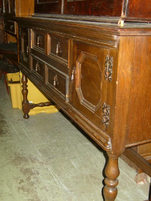 Appraisal: A Jacobean revival oak dresser fitted with two long central