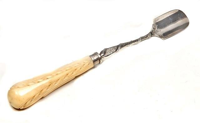 Appraisal: A VICTORIAN SILVER AND IVORY HANDLED STILTON SCOOP the blade