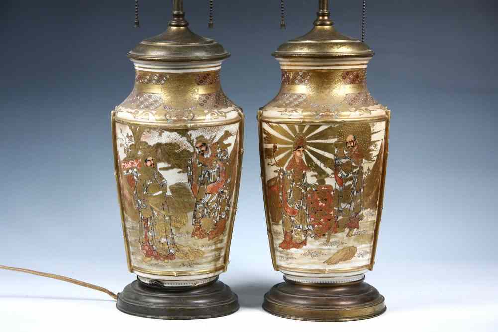 Appraisal: LAMPS - Pair of Satsuma decorated pottery vases wired and