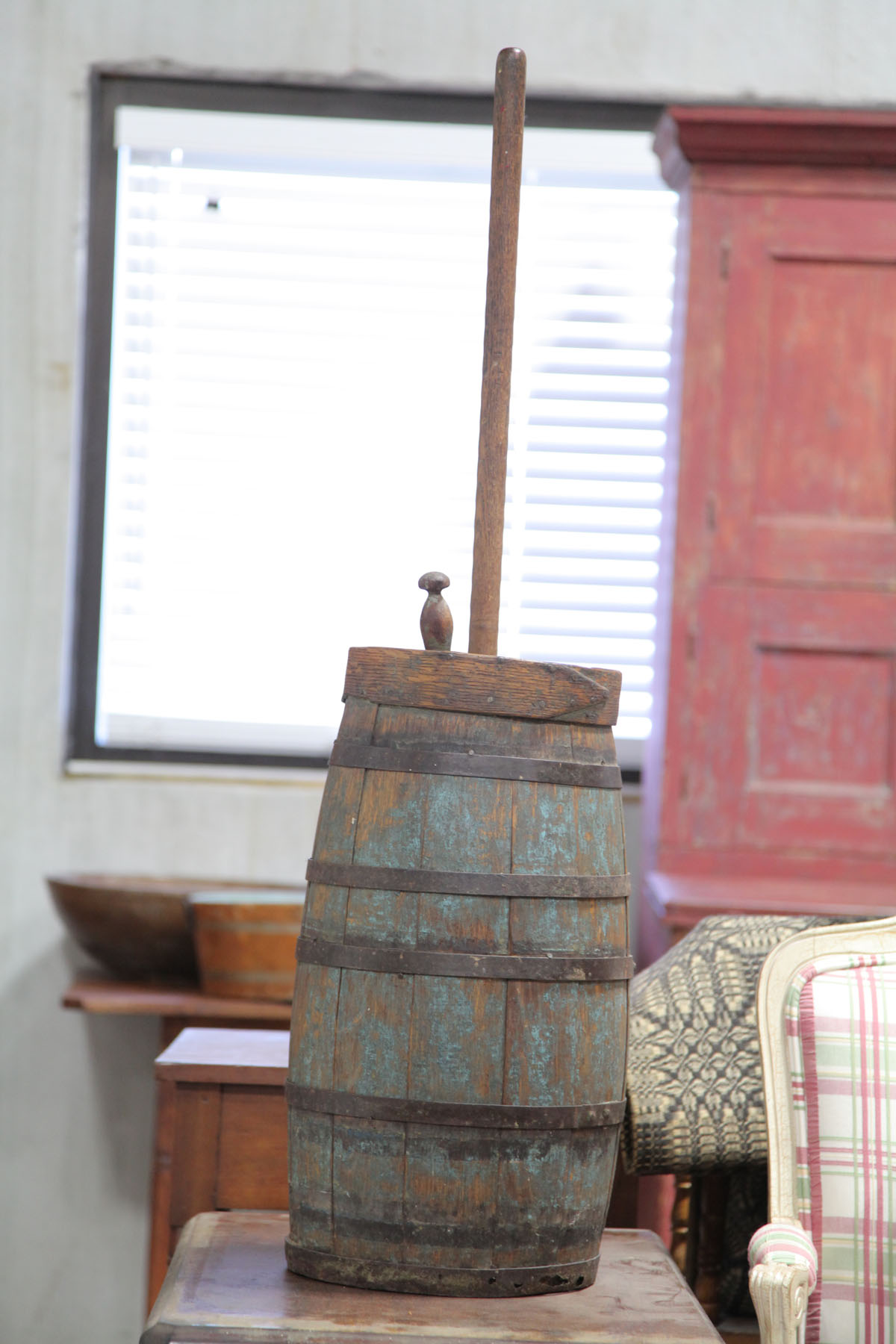 Appraisal: WOODEN BUTTER CHURN American th century Stave and cast iron