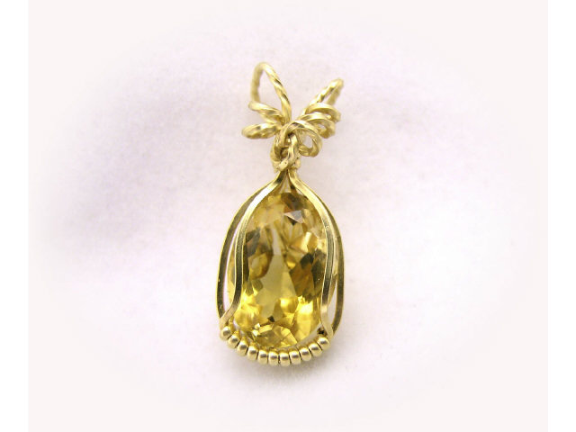 Appraisal: K yellow gold pendant with natural-style cut citrine approximately ct