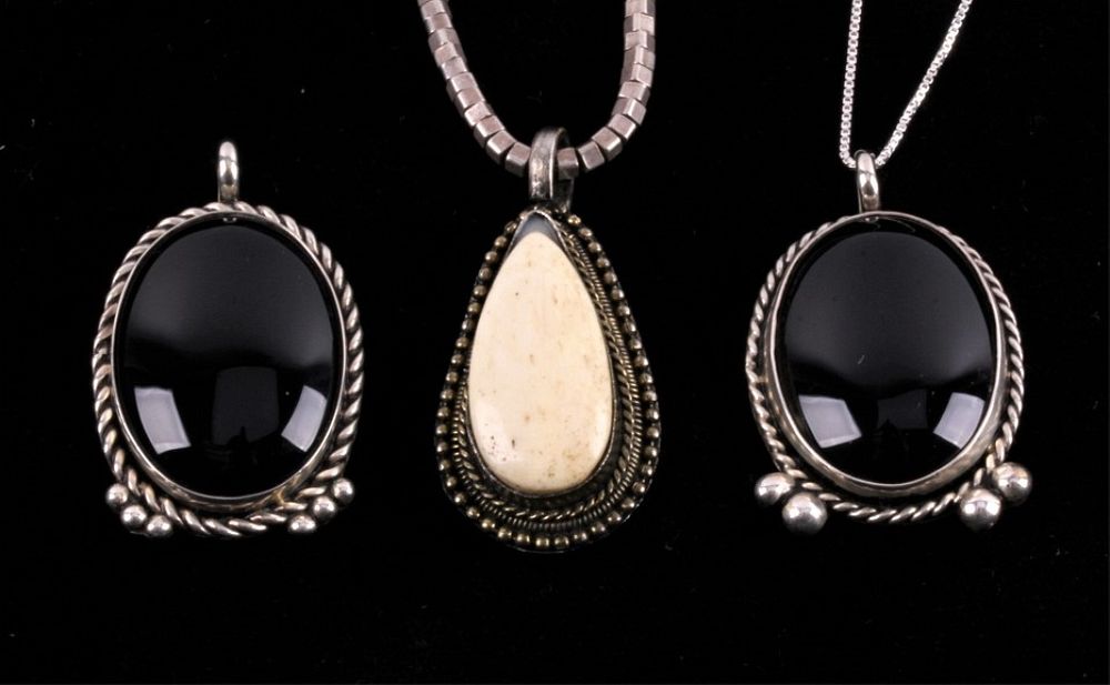 Appraisal: Navajo Signed Black Onyx White Buffalo Pendants Included in this