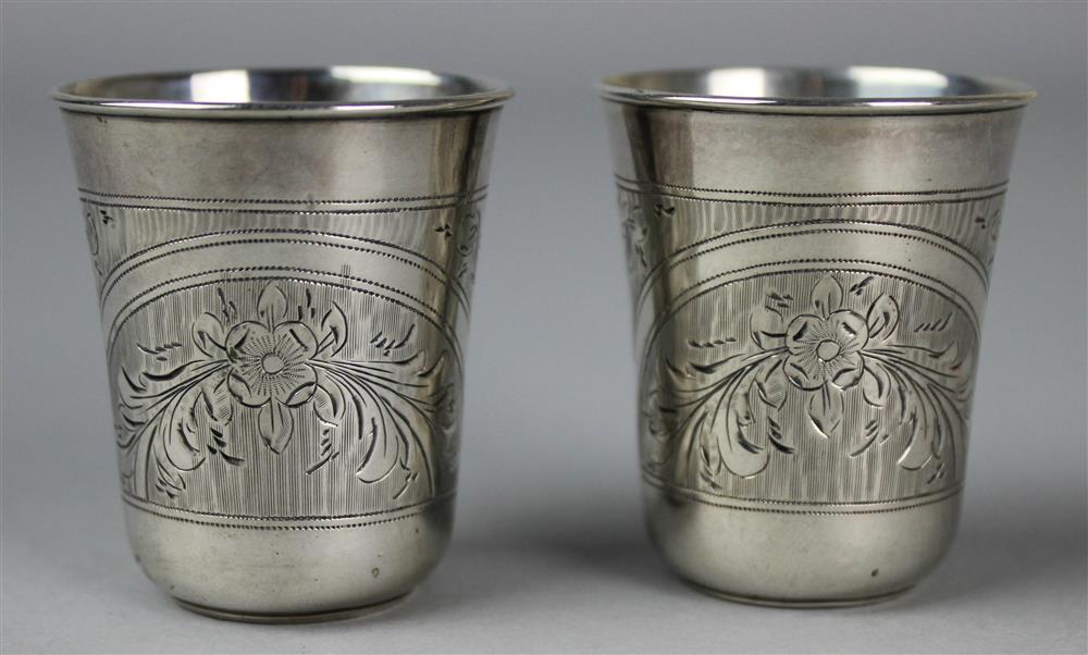 Appraisal: PAIR OF RUSSIAN SILVER VODKA CUPS marks for Moscow -