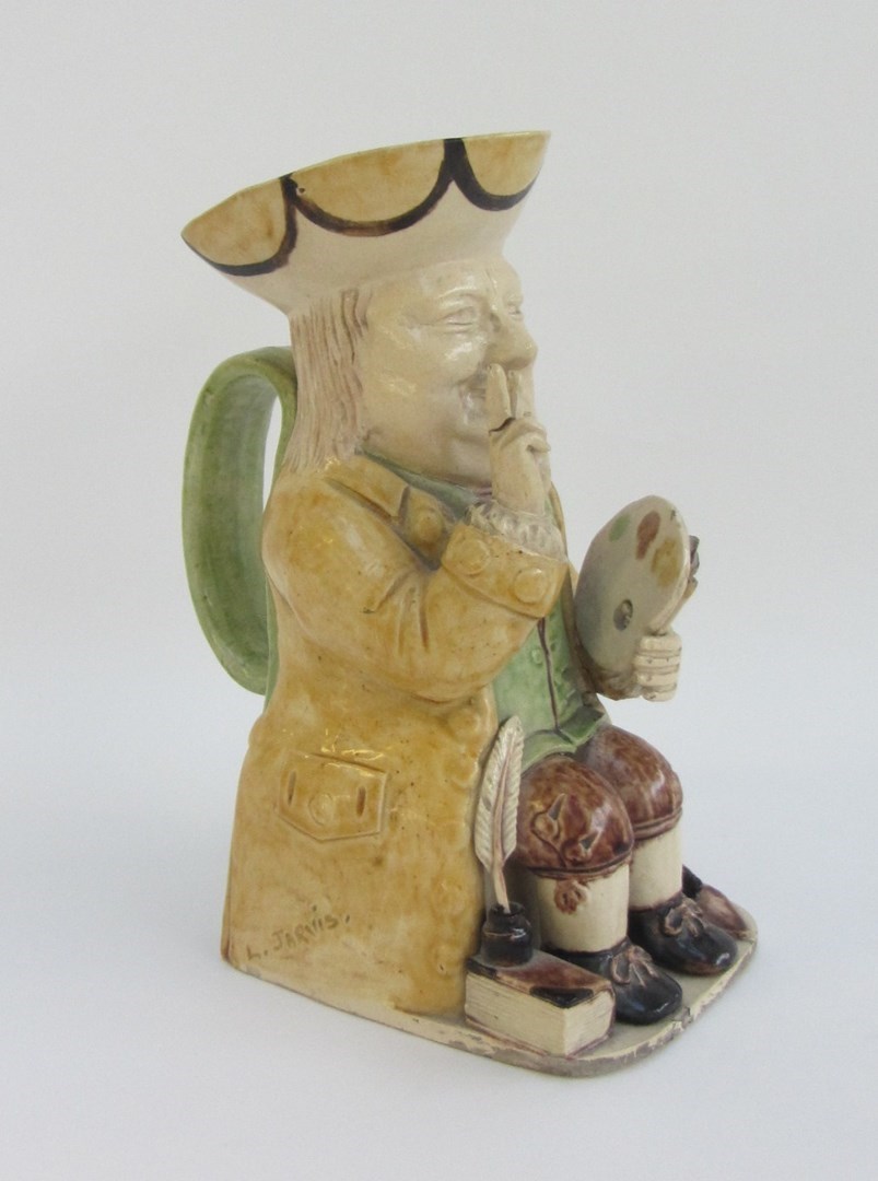 Appraisal: A pottery character Toby jug by L JARVIS modelled as