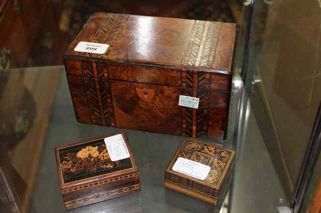 Appraisal: AN OLD WALNUT TEA CADDY with bands of parquetry decoration