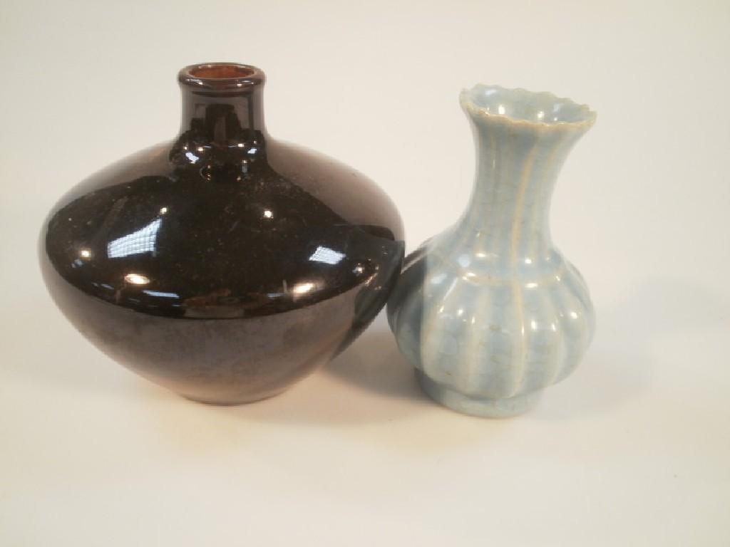 Appraisal: A Chinese small Celadon glazed flared baluster vase together with