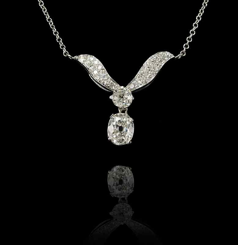 Appraisal: DIAMOND DROP NECKLACE K white gold necklace with an articulated