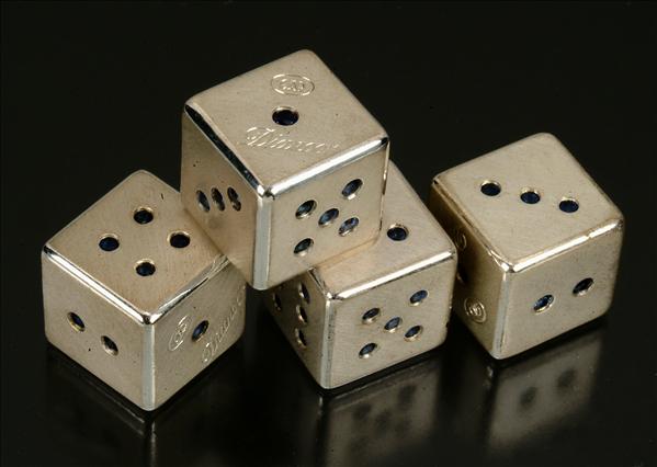 Appraisal: A set of four sapphire set dice by Dianoor each