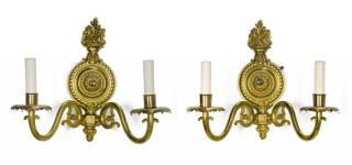 Appraisal: A PAIR OF BRASS TWO-LIGHT SCONCES th century Each two-light