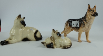 Appraisal: Royal Doulton Alsatian HN Siamese Cat lying and Kittens Playing