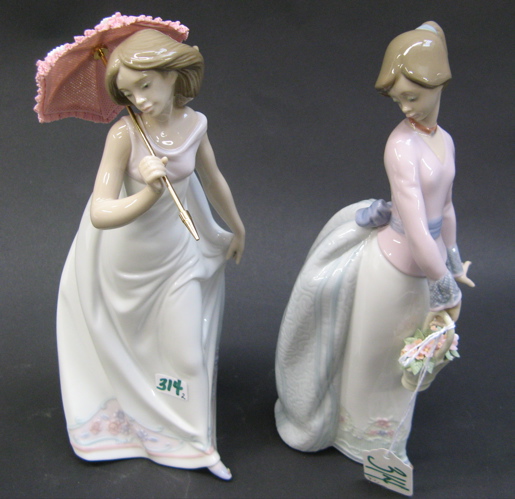 Appraisal: TWO SPANISH LLADRO GLAZED PORCELAIN FIGURES Afternoon Promenade a young