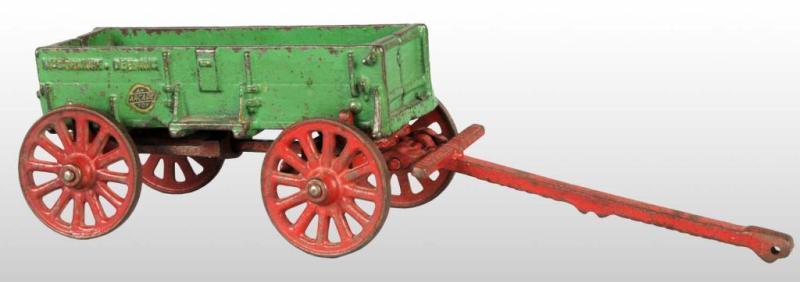 Appraisal: Cast Iron Arcade McCormick Deering Wagon Toy Description Has Arcade