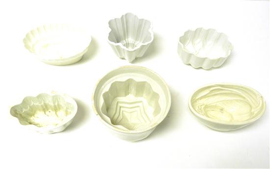 Appraisal: White Ironstone china molds six pieces wedgwood leaf marked ''Wedgewood