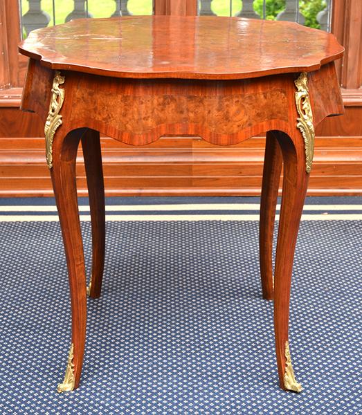 Appraisal: BURR WALNUT AND KING WOOD ORMOLU MOUNTED SHAPED CENTRE TABLE