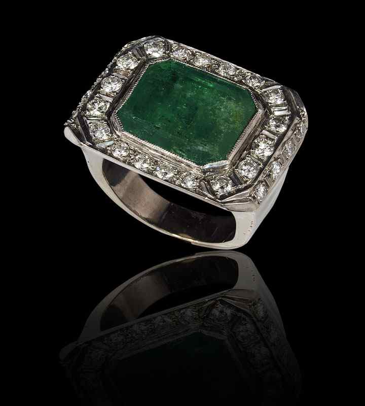 Appraisal: K CT EMERALD AND DIAMOND RING K white gold ring