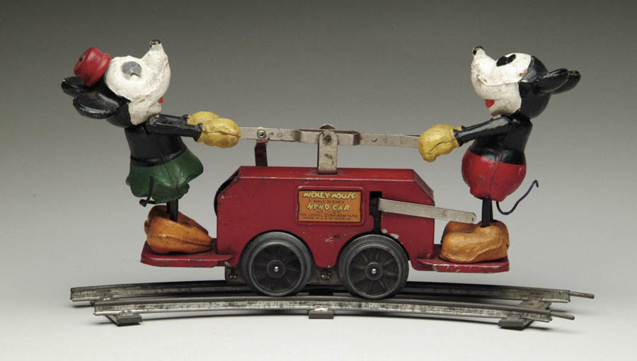 Appraisal: LIONEL MICKEY MOUSE AND MINNIE HANDCAR Large composition Mickey and