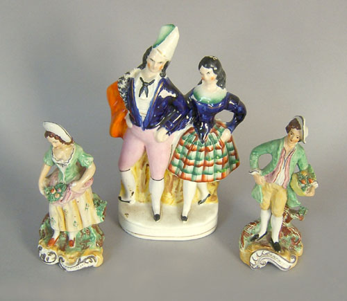 Appraisal: Three Staffordshire figures h h