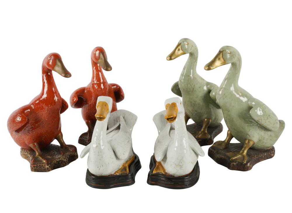 Appraisal: THREE PAIRS OF GLAZED CERAMIC DUCK FIGURESeach unsigned comprising one