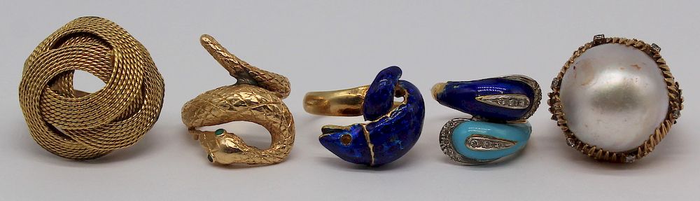 Appraisal: JEWELRY Grouping of Gold Rings Includes a kt yellow gold